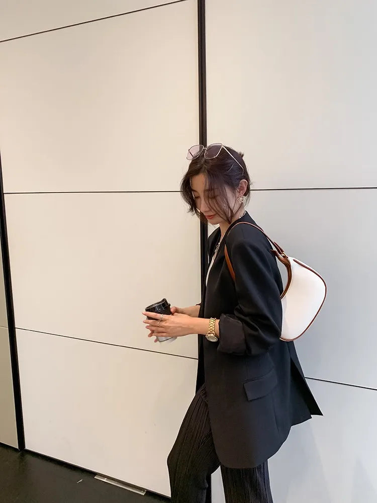 Curved Contrast-Trim Shoulder Bag