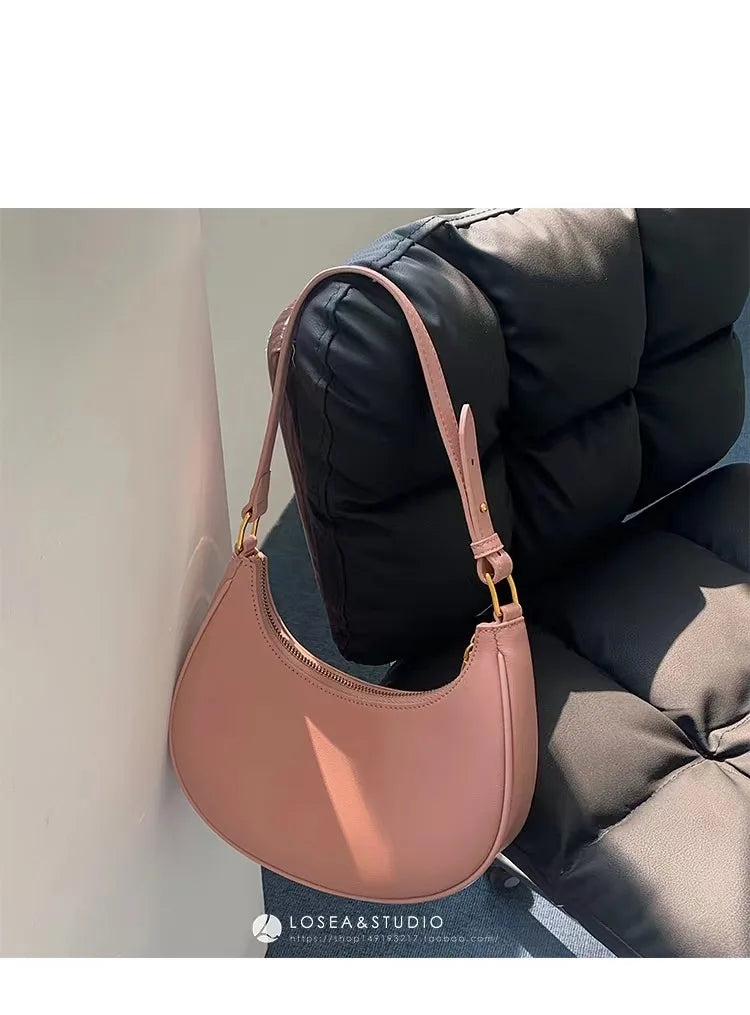 Curved Contrast-Trim Shoulder Bag