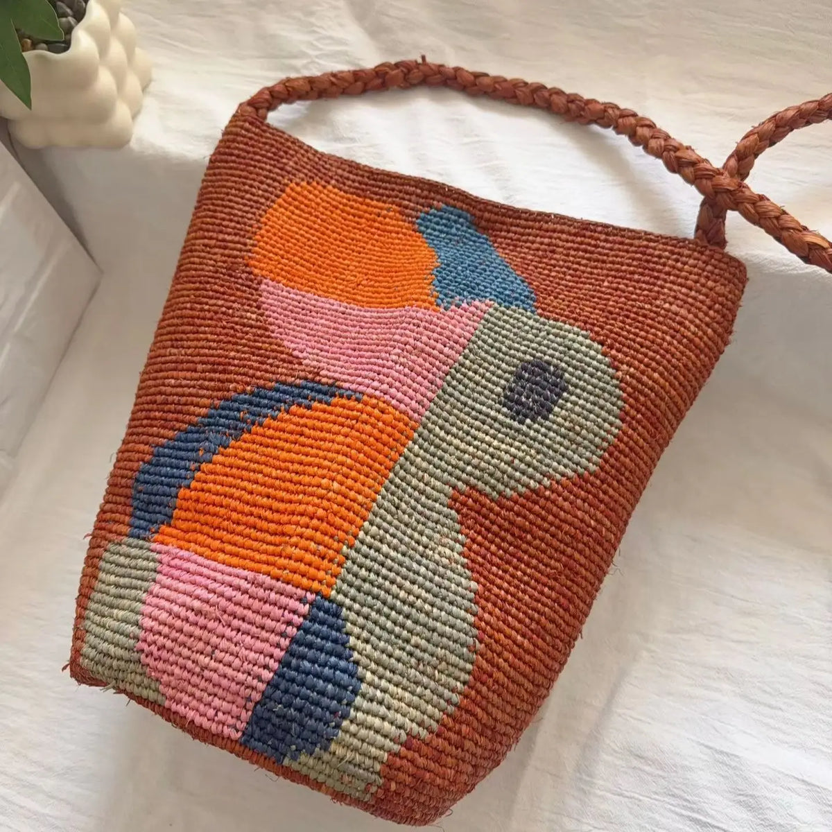 Abstract-Motif Woven Bucket Bag
