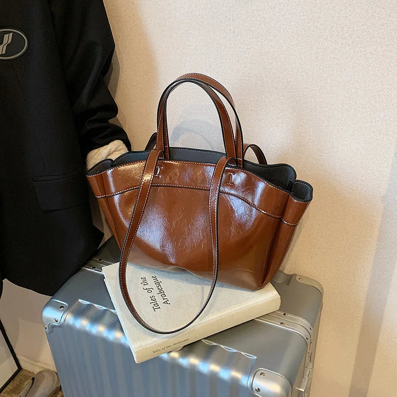 Winged Top-Handle Tote Bag