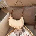 Curved Contrast-Trim Shoulder Bag