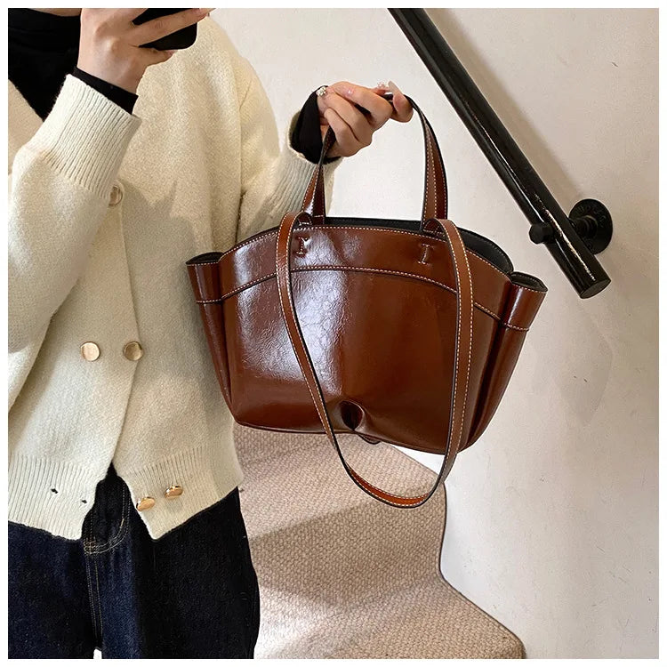 Winged Top-Handle Tote Bag