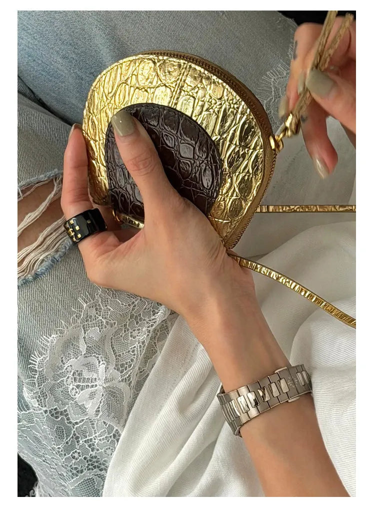 Embossed Crescent Crossbody Bag