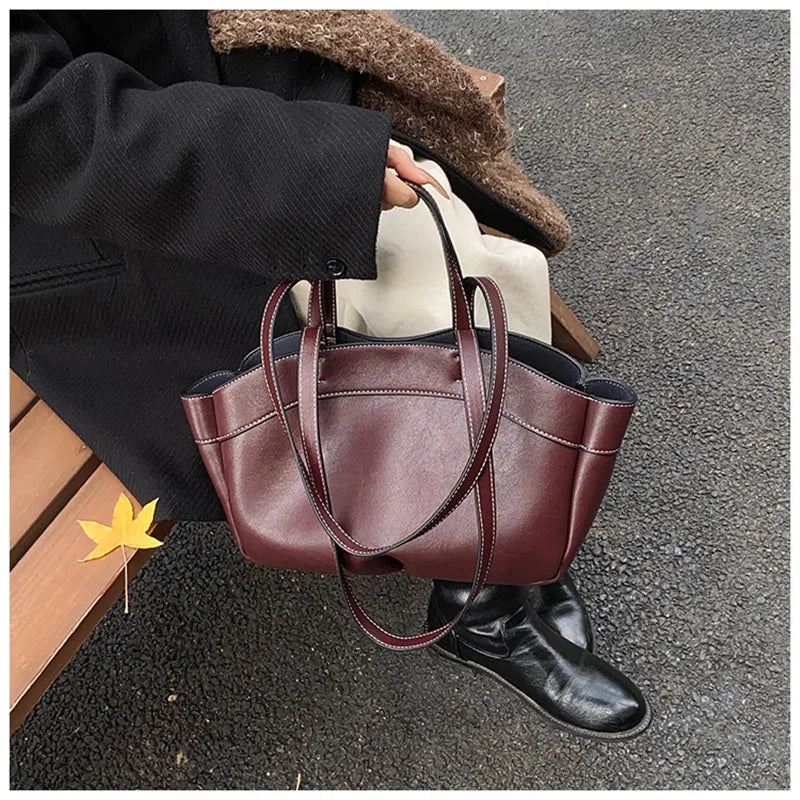 Winged Top-Handle Tote Bag
