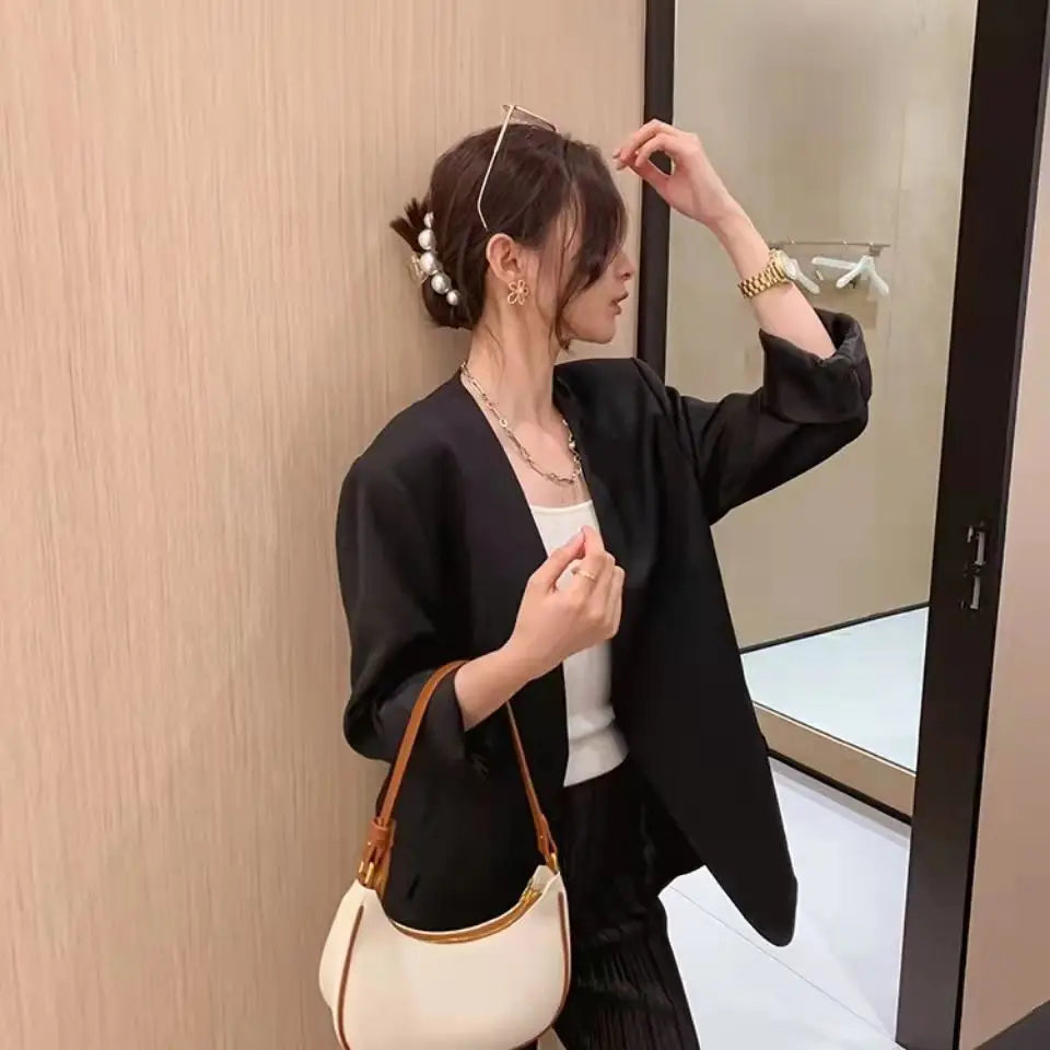Curved Contrast-Trim Shoulder Bag