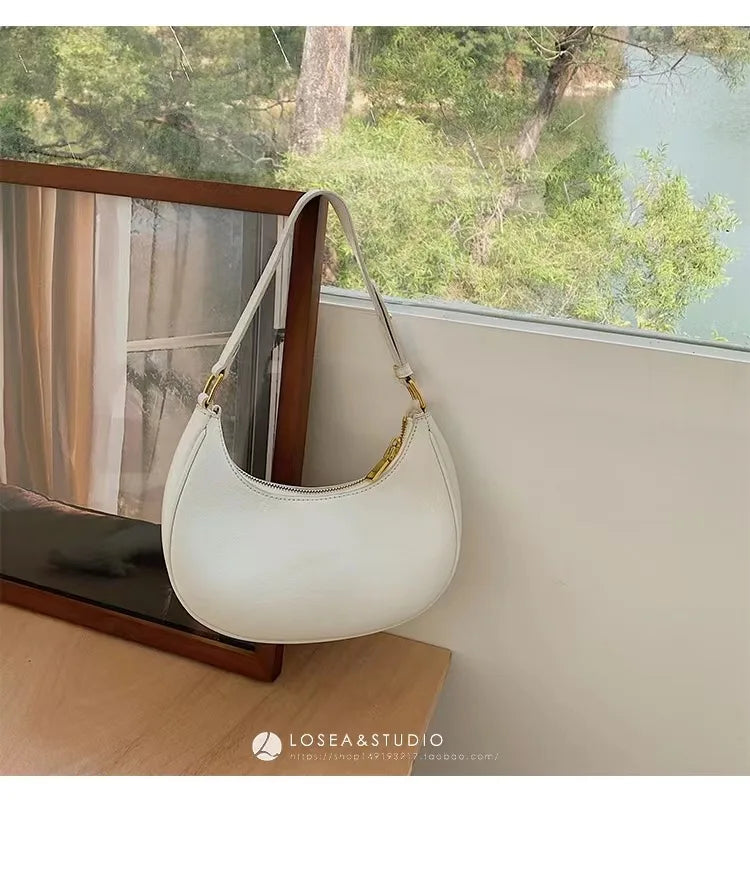 Curved Contrast-Trim Shoulder Bag
