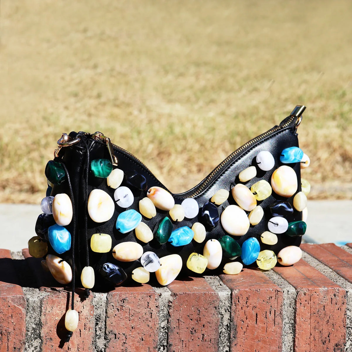 Oval-Embellished Shoulder Bag