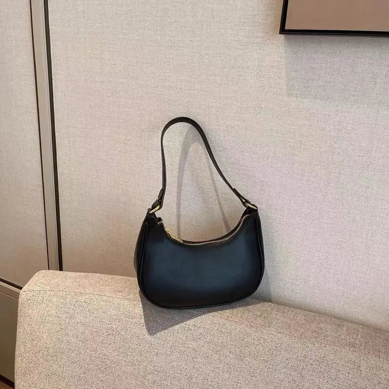 Curved Contrast-Trim Shoulder Bag