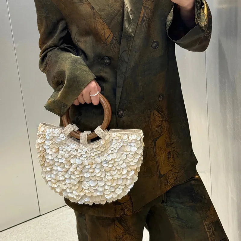Disc-Embellished Ring-Handle Bag