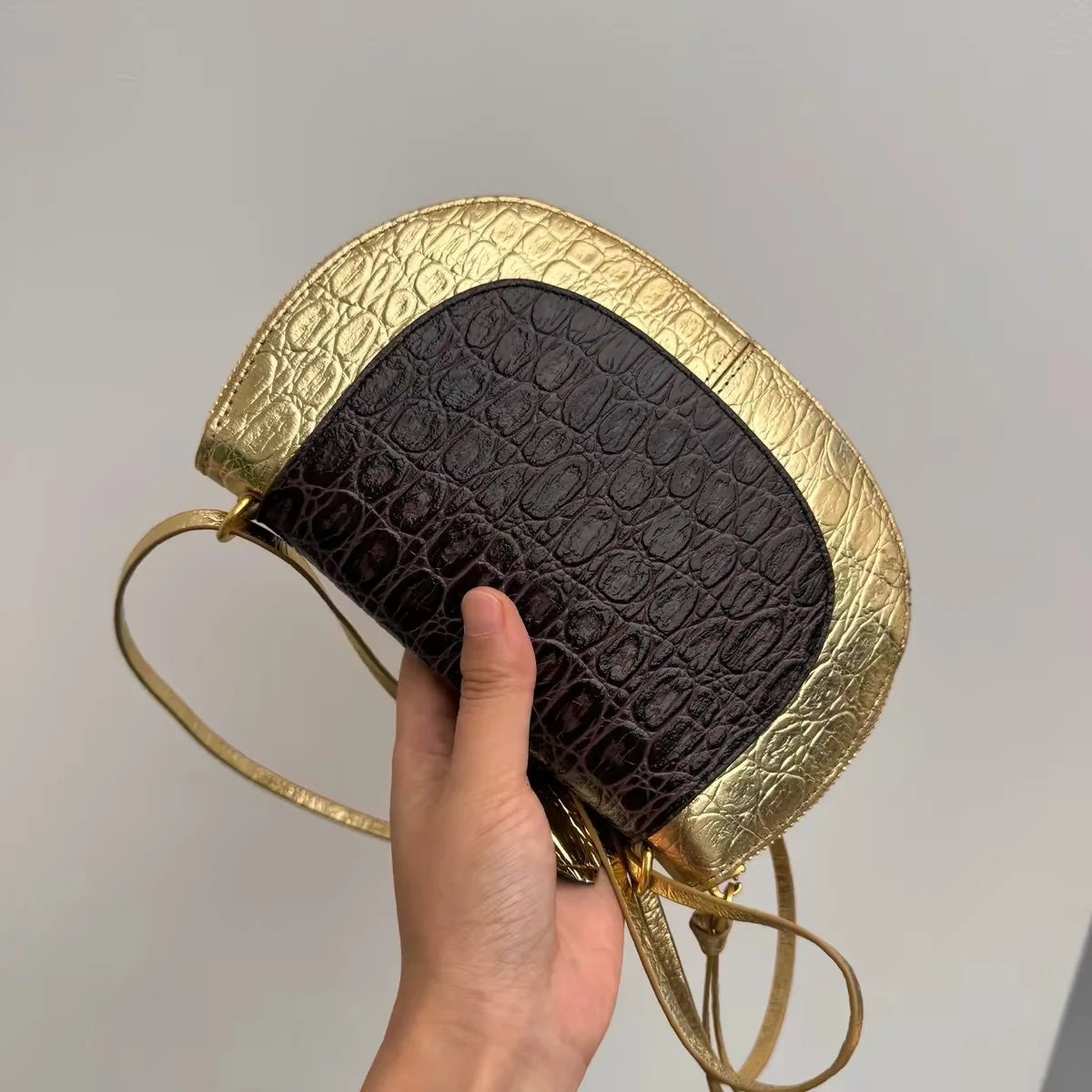 Embossed Crescent Crossbody Bag