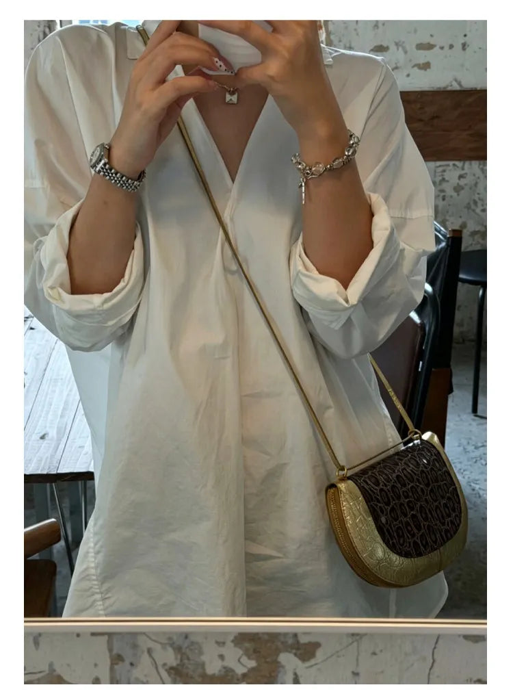 Embossed Crescent Crossbody Bag