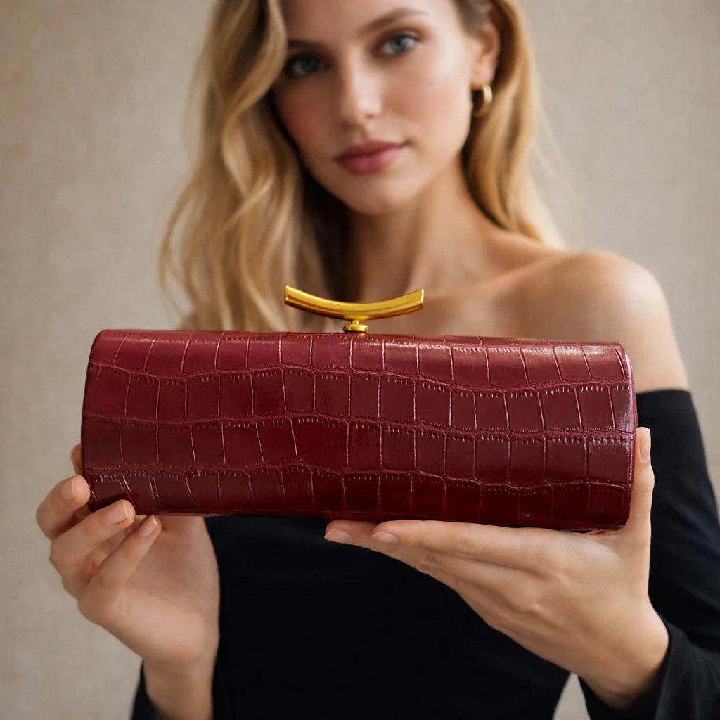 Croc-Embossed Cylinder Clutch Bag