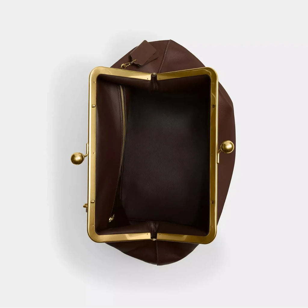 Folded Kiss-Lock Clutch Bag